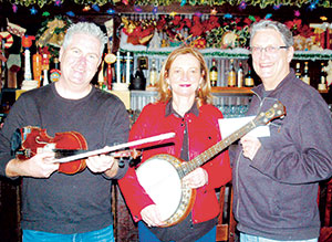 The Burren’s Tommy McCarthy and Louise Costello (left, center) performed their enchanting Celtic music at thier album release party, earning SHC over $3000.