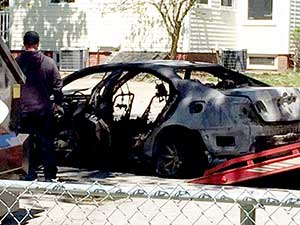 What remains of the car involved in the fire at Tufts . — Photo by Bobbie Toner